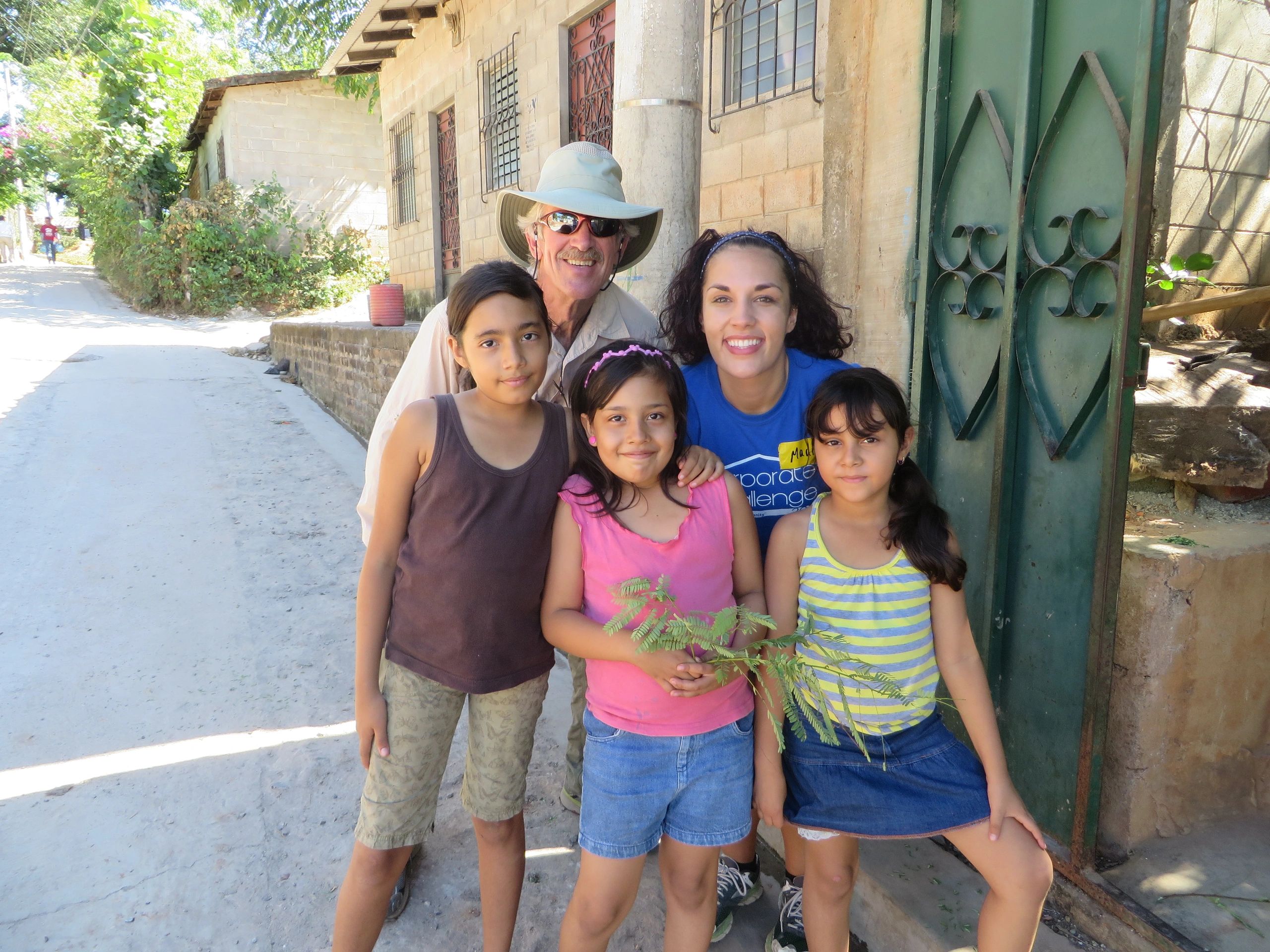 Family on village street